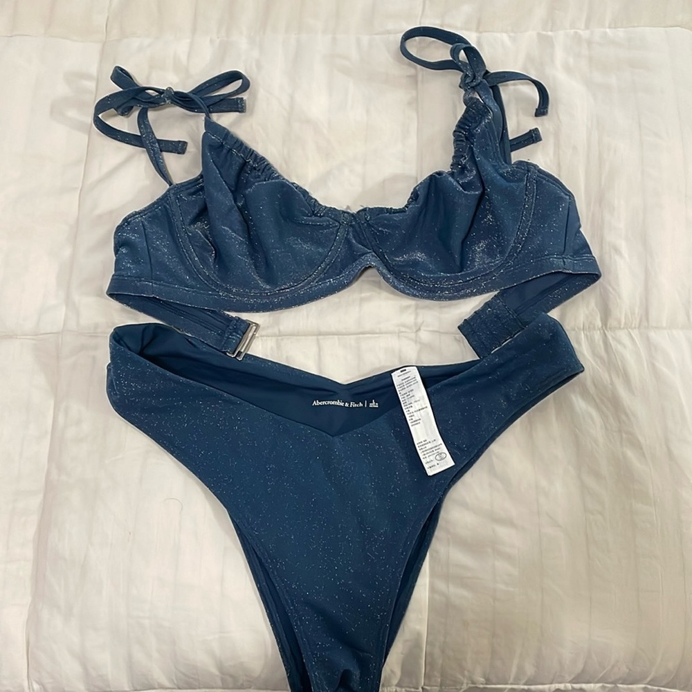 Abercrombie curve love bathing suit top size M. Bottoms size large.